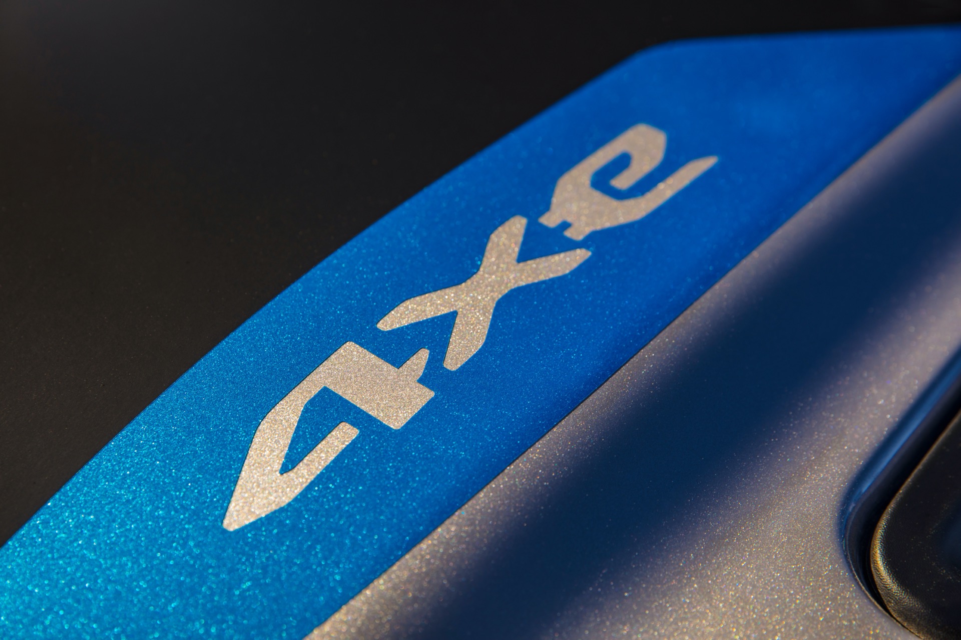 The 4xe Logo On The Hood Of The 2021 Jeep® Wrangler Lets The Body Color Show Through.