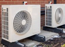 Two,air,source,heat,pumps,installed,on,the,exterior,of