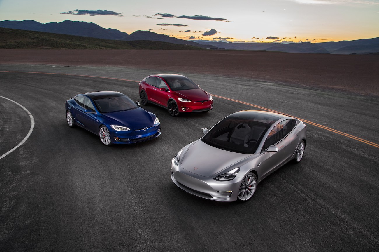 Tesla VS BMW electrificados